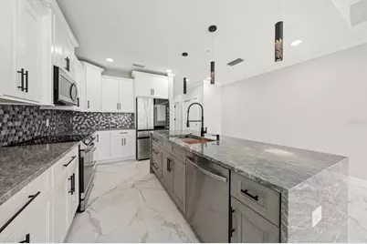 211 Dolphin Point #201, Clearwater, FL 33767 - Photo 5