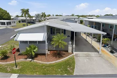 6907 Americana Drive NE #101, Saint Petersburg, FL 33702 - Photo 1