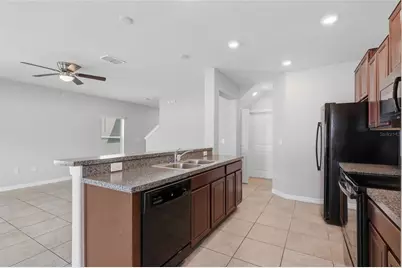 7412 French Marigold Avenue, Tampa, FL 33619 - Photo 9