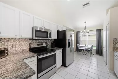 4250 Pine Isle Drive, Lutz, FL 33558 - Photo 11