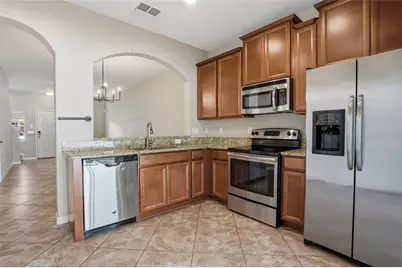 31209 Gossamer Way, Wesley Chapel, FL 33543 - Photo 9