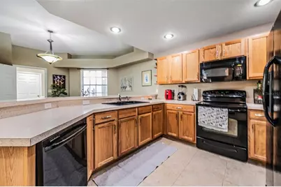 1827 Hammocks Avenue #1827, Lutz, FL 33549 - Photo 7