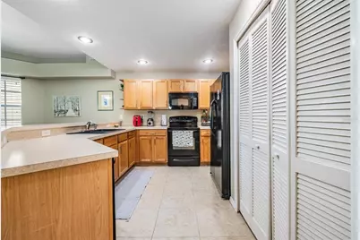 1827 Hammocks Avenue #1827, Lutz, FL 33549 - Photo 5