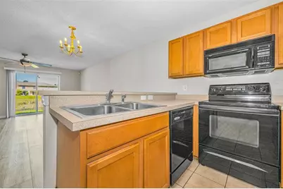 8015 Savannah Sunset Lane, Tampa, FL 33615 - Photo 11