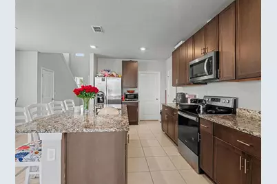7144 Boggy Creek Place, Parrish, FL 34219 - Photo 9