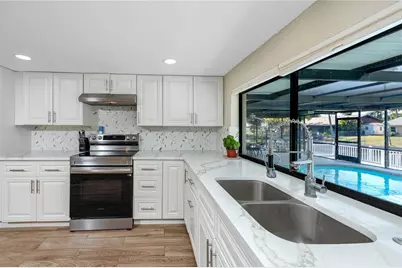 9903 San Mateo Way, Port Richey, FL 34668 - Photo 13