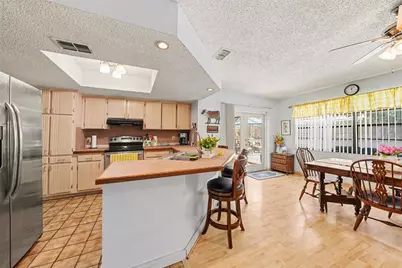 8731 Woodcrest Drive, Port Richey, FL 34668 - Photo 11