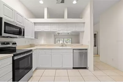 6600 100th Way N #24B, Saint Petersburg, FL 33708 - Photo 9