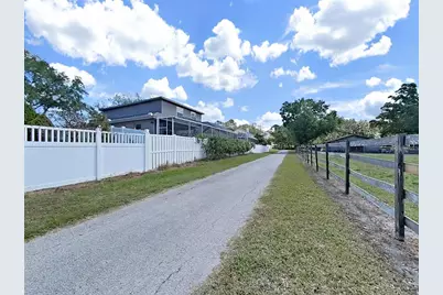 1083 Misty Hollow Lane, Tarpon Springs, FL 34688 - Photo 35