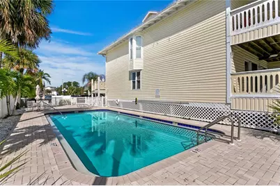 10399 Paradise Boulevard #106B, Treasure Island, FL 33706 - Photo 27