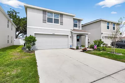 13765 Whiskey Daisy Drive, Dade City, FL 33525 - Photo 1