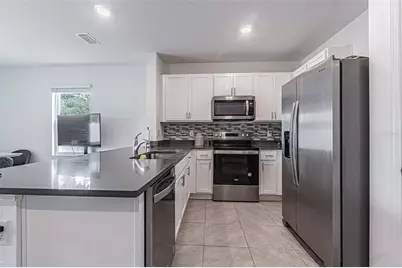 6358 Sophie Oaks Court, Tampa, FL 33610 - Photo 7