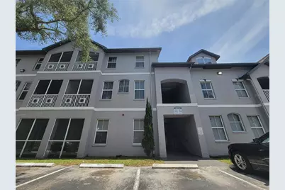 5052 Sunridge Palms Drive #104, Tampa, FL 33617 - Photo 1