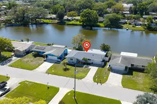 1218 Lazy Lake Rd E, Dunedin, FL 34698 - Photo 3