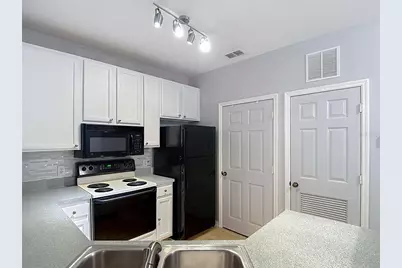 10201 Courtney Palms Boulevard #203, Tampa, FL 33619 - Photo 11
