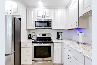 2650 Countryside Boulevard #E103, Clearwater, FL 33761 - Photo 7