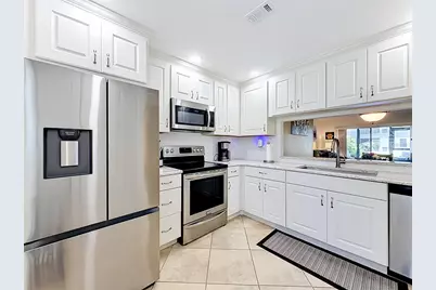 2650 Countryside Boulevard #E103, Clearwater, FL 33761 - Photo 5