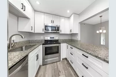 1281 Pine Ridge Circle E #A2, Tarpon Springs, FL 34688 - Photo 9