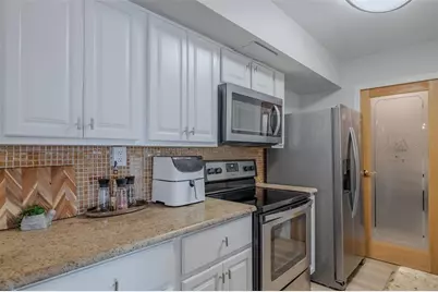 10355 Paradise Boulevard #511, Treasure Island, FL 33706 - Photo 13
