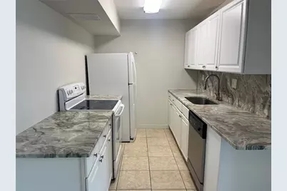 10355 Paradise Boulevard #113, Treasure Island, FL 33706 - Photo 5