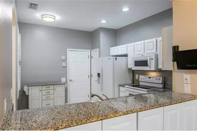 3326 Covered Bridge Drive W, Dunedin, FL 34698 - Photo 9