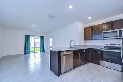 5460 Warrington Town Path, Wesley Chapel, FL 33545 - Photo 13