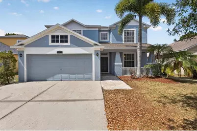 8405 Canterbury Lake Boulevard, Tampa, FL 33619 - Photo 1