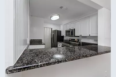2101 Fox Chase Boulevard #107, Palm Harbor, FL 34683 - Photo 13