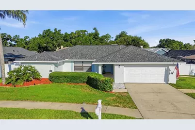 4957 Lake Valencia Boulevard E, Palm Harbor, FL 34684 - Photo 1