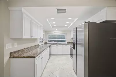 2447 Grove Ridge Drive, Palm Harbor, FL 34683 - Photo 13