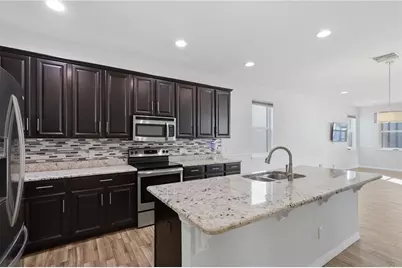 32659 Harmony Oaks Drive, Wesley Chapel, FL 33545 - Photo 5