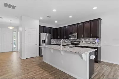 32659 Harmony Oaks Drive, Wesley Chapel, FL 33545 - Photo 9