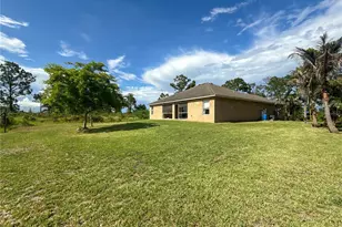 954 Marilyn Ave S, Lehigh Acres, FL 33974 - Photo 25
