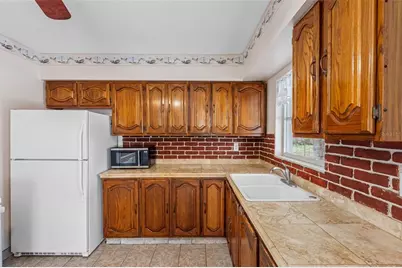 126 W Grapefruit Circle, Clearwater, FL 33759 - Photo 29