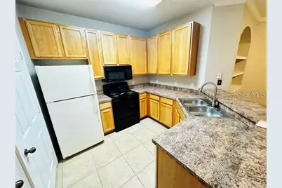10106 Courtney Oaks Circle #104, Tampa, FL 33619 - Photo 3