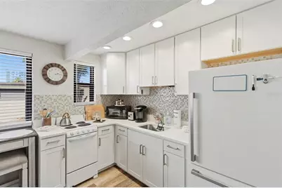 6800 Sunset Way #106, Saint Pete Beach, FL 33706 - Photo 9