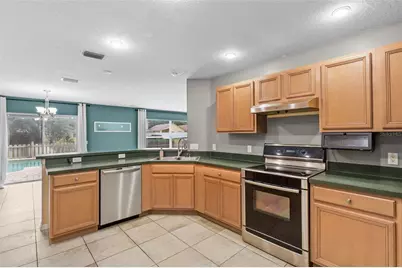 11913 Mango Groves Boulevard, Seffner, FL 33584 - Photo 23