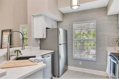 9130 Lake Chase Island Way #9130, Tampa, FL 33626 - Photo 7