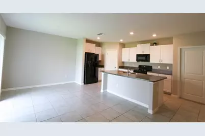 3715 Daisy Bloom Place, Tampa, FL 33619 - Photo 9