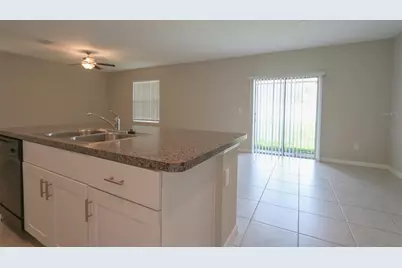 3715 Daisy Bloom Place, Tampa, FL 33619 - Photo 7