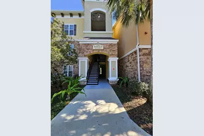 10023 Courtney Palms Boulevard #101, Tampa, FL 33619 - Photo 1