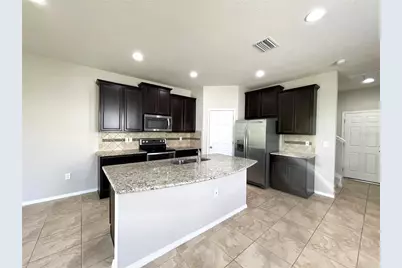 8751 Turnstone Haven Place, Tampa, FL 33619 - Photo 3