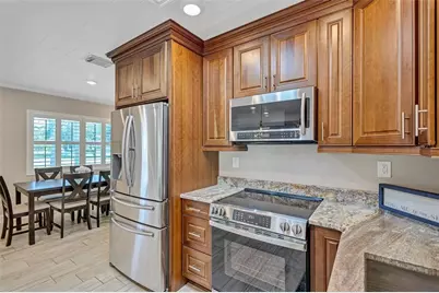 302 S Mayo Street, Crystal Beach, FL 34681 - Photo 19