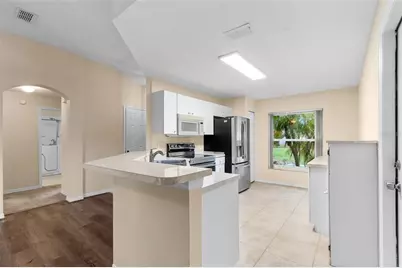 1414 Bluewater Drive, Sun City Center, FL 33573 - Photo 15