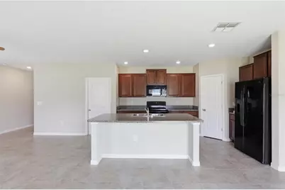 7412 Rosy Periwinkle Court, Tampa, FL 33619 - Photo 11