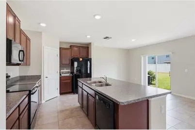 7412 Rosy Periwinkle Court, Tampa, FL 33619 - Photo 13