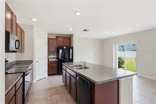7412 Rosy Periwinkle Ct, Tampa, FL 33619 - Photo 13