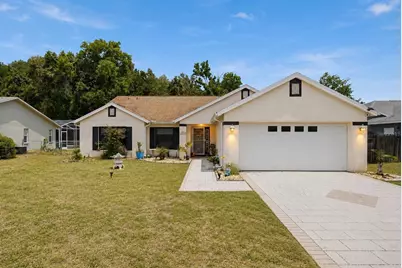 10249 Rainbow Oaks Drive, Hudson, FL 34667 - Photo 1