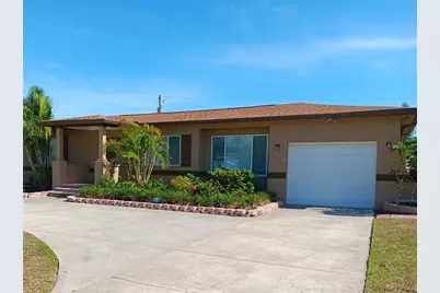 4864 Lake Charles Drive N, Kenneth City, FL 33709 - Photo 1