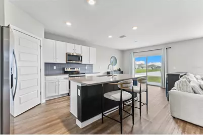 9728 Crescent Ray Drive, Wesley Chapel, FL 33545 - Photo 11